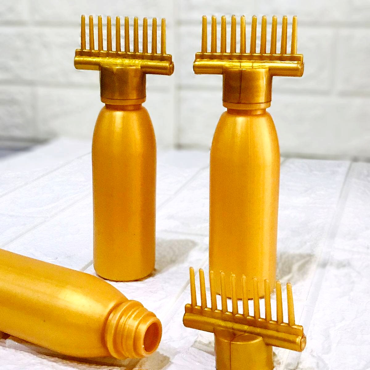 Hair Oil Comb Bottle In Pakistan